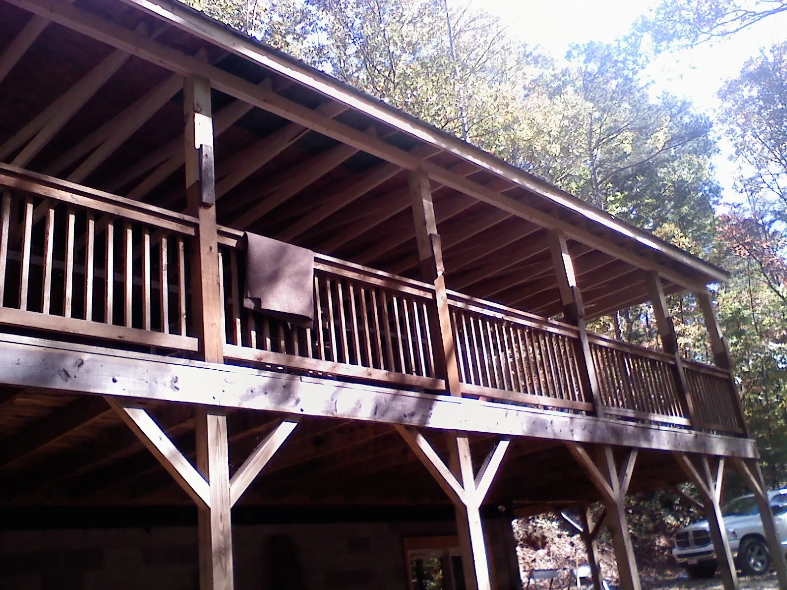 Timber framing under a new elevated porch and deck — Roof Leak Repair in Upper Marlboro by Roofing Brothers